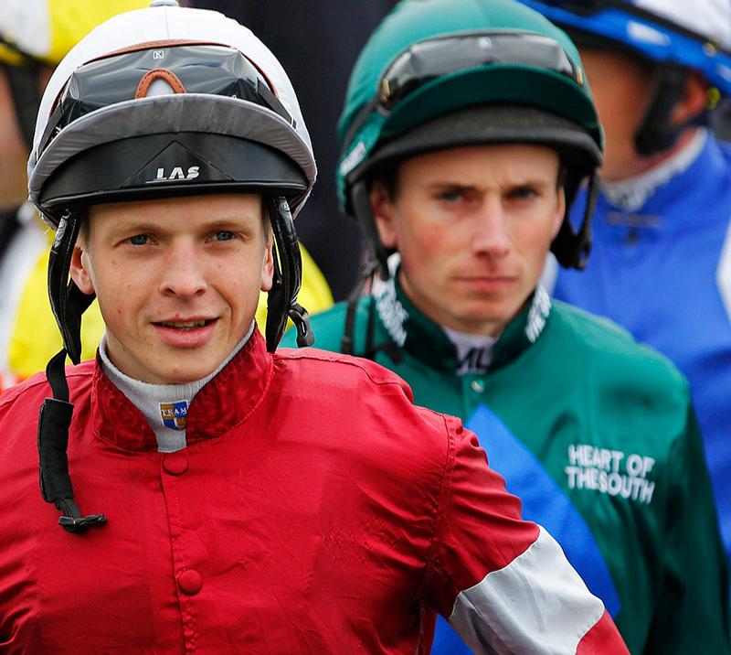 Two male jockeys